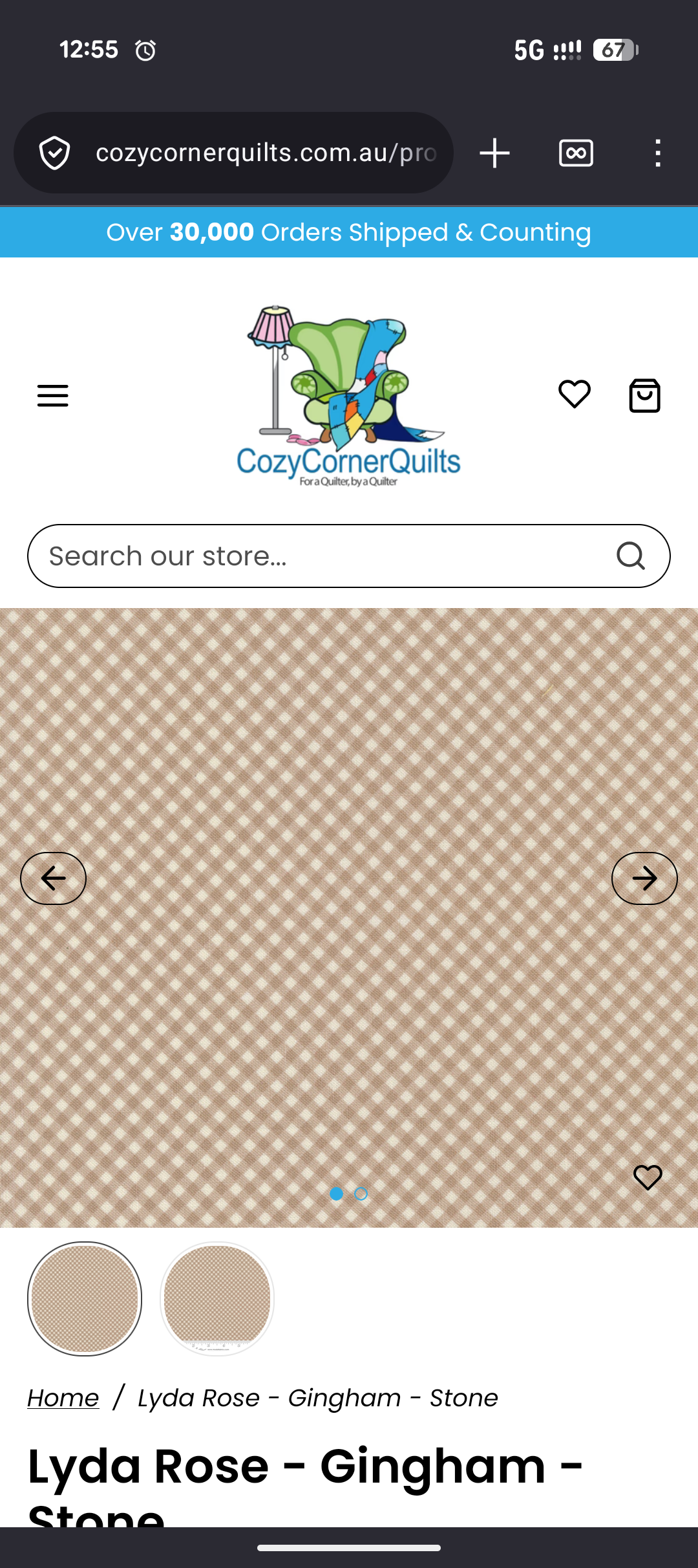 a product photograph of tan gingham fabric from a quilting online store